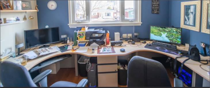Photo of a cramped two-person home office space