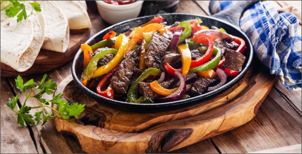 A tray of steak fajitas