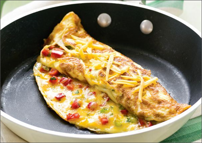 An omelet in a black pan