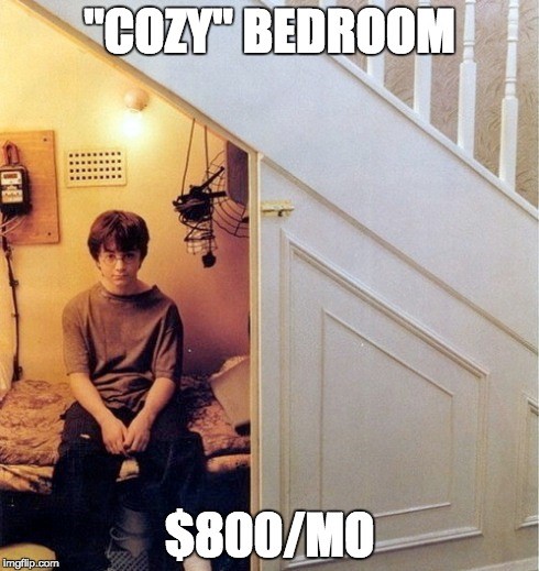 Harry Potter sitting in his cupboard under the stairs. Caption reads "Cozy" bedroom - $800 a month.