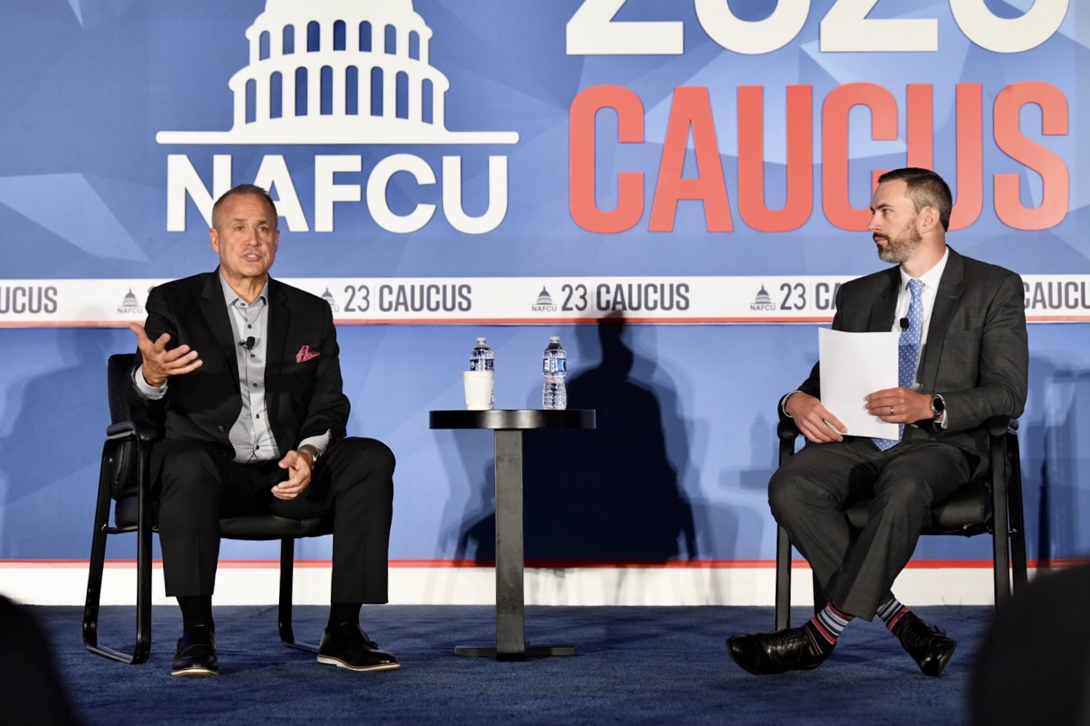 Jim Nussle (left) and Greg Mesack discuss America's Credit Unions at NAFCU's 2023 Congressional Caucus