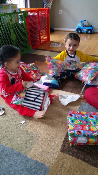Dec 2015 Kyse and Ava Opening Presents